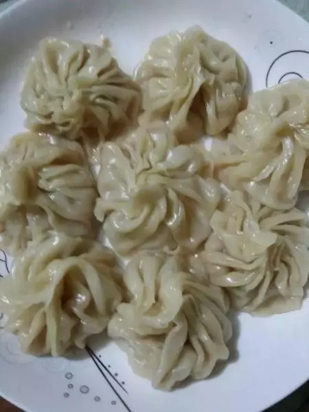 饺子皮包的菊花小笼包